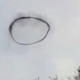 Illustration for article titled A weird black ring appeared in the sky in England and then disappeared